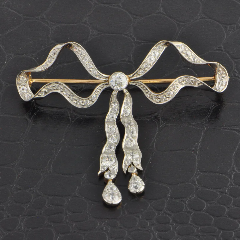 Personalized Jewelry At Special Discount Rates Antique Edwardian Diamond Bow Brooch in 18k Yellow Gold and Platinum Personalized Jewelry At Special Discount Rates Antique Edwardian Diamond Bow Brooch in 18k Yellow Gold and Platinum
