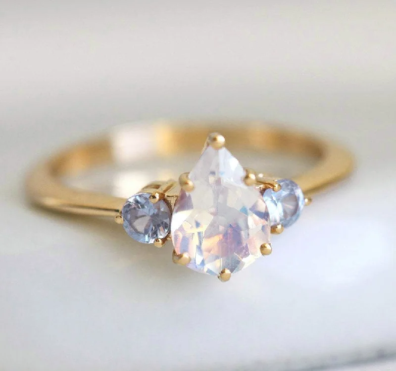 Jewelry Sale – Exclusive Styles At Lower Prices Pear Rainbow Moonstone Ring With Light Blue Sapphires Jewelry Sale – Exclusive Styles At Lower Prices Pear Rainbow Moonstone Ring With Light Blue Sapphires