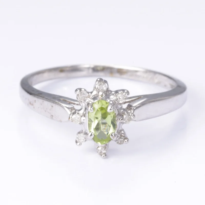 Shop Dazzling Jewelry At The Best Prices 14k White Gold Peridot and Diamond Ring | 0.22ct, 0.05ctw | Size 6.75 Shop Dazzling Jewelry At The Best Prices 14k White Gold Peridot and Diamond Ring | 0.22ct, 0.05ctw | Size 6.75