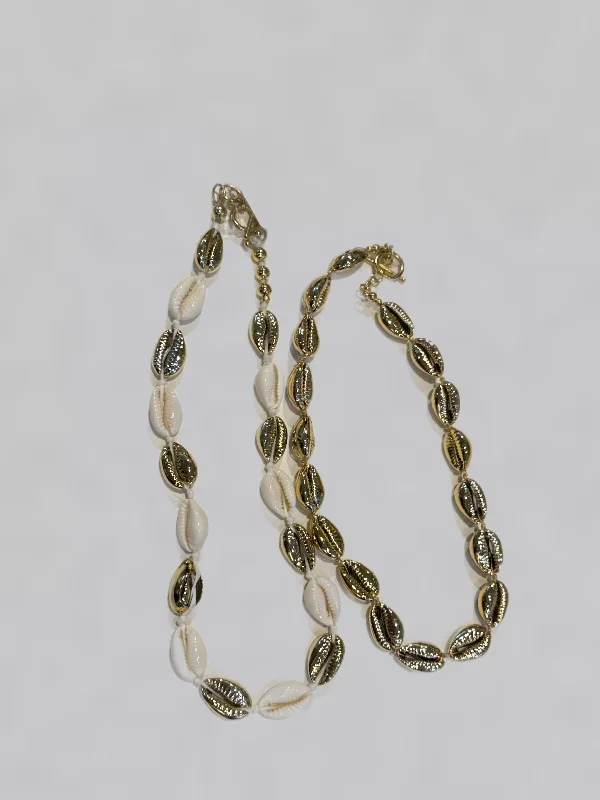 Must-Have Jewelry Pieces At Reduced Prices Cowrie Shell Choker Necklaces by Kimberly Aman Must-Have Jewelry Pieces At Reduced Prices Cowrie Shell Choker Necklaces by Kimberly Aman