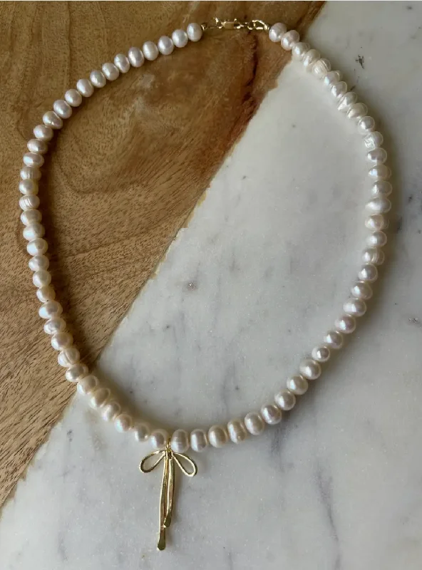 Shop Signature Jewelry Styles At Exclusive Prices Pearl Bow Necklace by Jessica Matrasko Jewelry Shop Signature Jewelry Styles At Exclusive Prices Pearl Bow Necklace by Jessica Matrasko Jewelry