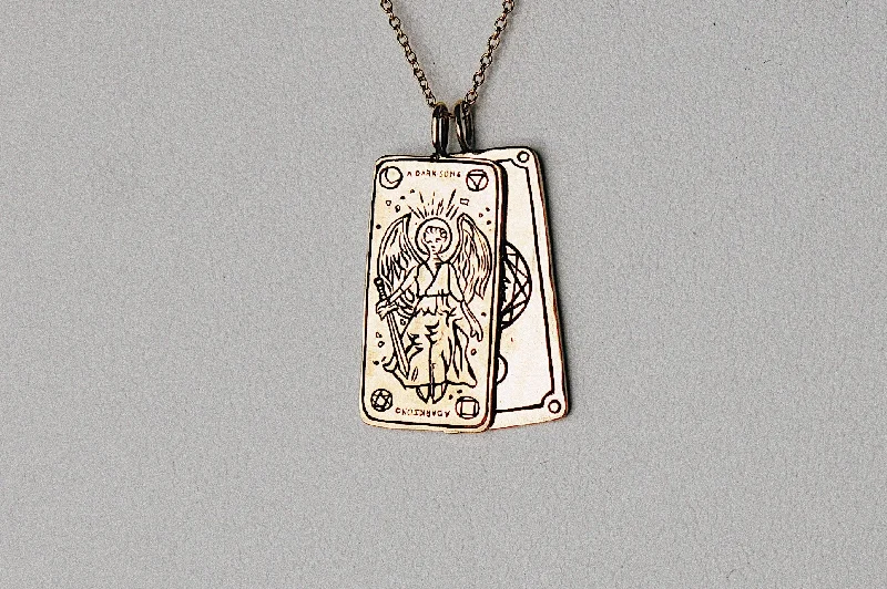 High-End Sparkle, Low-End Prices – Shop Now A Dark Song Tarot Card Necklace