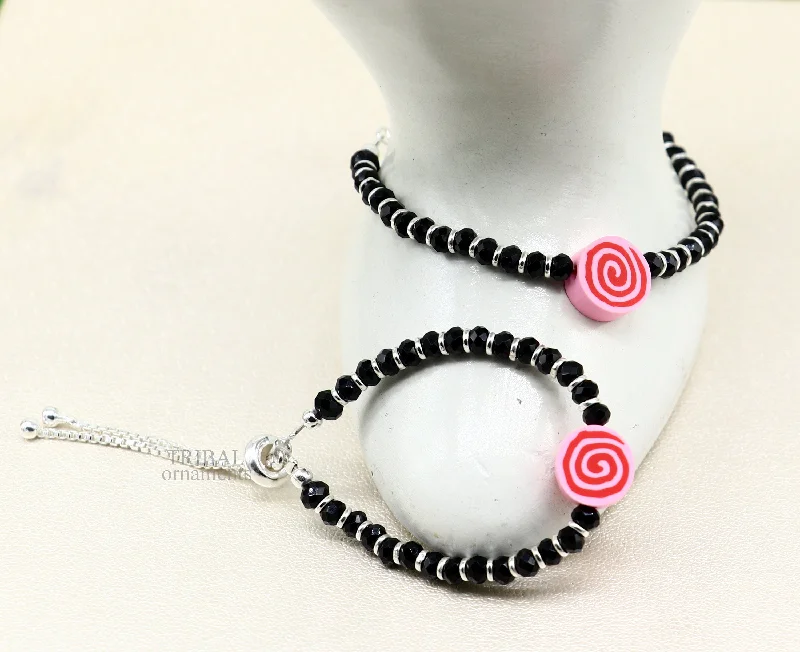 Bohemian-Inspired Jewelry For Free-Spirited Fashion Stylish baby black beaded bangle bracelet or ankle bracelet 925 sterling silver handmade customized kids jewelry form india bbr41